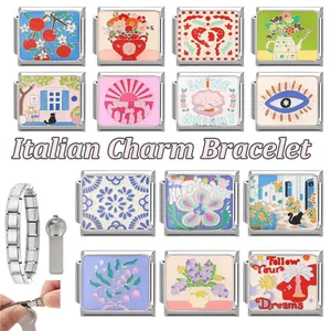 Macro detail of Italian charm bracelet links featuring floral and evil eye enamel designs