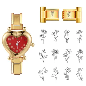 Customizable gold heart watch with red dial showing laser engraving options and floral patterns