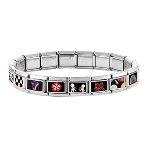 Detail of Italian charm bracelet links with colorful enamel heart and flower patterns