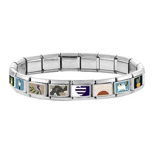 Macro detail of Italian charm bracelet links featuring colorful hand-painted animal motifs