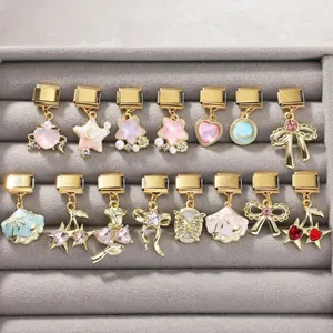 Collection de 15 breloques dorées pour bracelets à maillons italiens avec émail et pierres