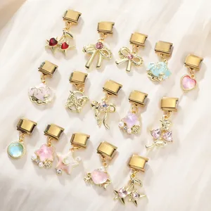 Maillons de charms italiens avec pendentifs cerise, papillon et étoile dorés