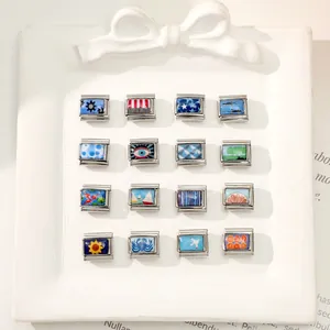 Macro shot of 16 Italian charm links with colorful enamel icons like crabs and planes