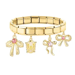 Détails du bracelet à breloques italien doré avec pendentifs nœuds rose et étoile