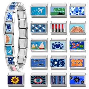 Blue theme Italian charm bracelet with modular links featuring evil eye and nautical icons