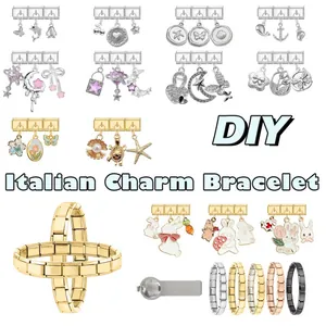 Detail of modular Italian charm bracelet links in silver, gold, and rose gold finishes