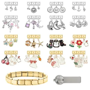 Macro view of stainless steel Italian charm bracelets with various colorful pendants