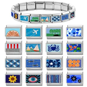 Italian style stainless steel modular link bracelet with blue evil eye and floral charms