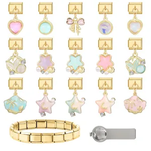 Macro view of modular Italian link bracelet charms with star and heart designs