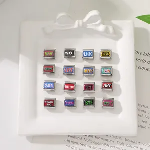 Flat lay of 16 colorful Italian charms with English quotes in a white ceramic dish