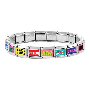 Detailed view of stainless steel Italian charm bracelet with colorful slogan links