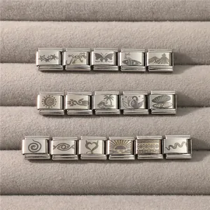 Macro view of 16-piece Italian charm links with laser-engraved animal and nature icons