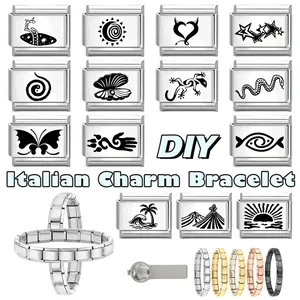 Macro view of modular Italian charms with black patterns and stainless steel base