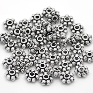 Distanziatori a fiocco di neve in argento antico 4mm per gioielli e bracciali DIY