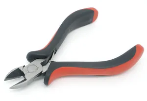 Close-up of industrial diagonal pliers with ergonomic red and black non-slip handles