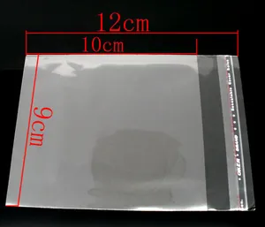 Transparenter OPP-Beutel selbstklebend 9x12cm mit roten Maßangaben auf schwarzem Grund