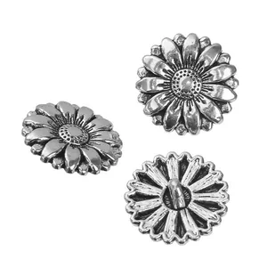 Detailed views of 18mm antique silver sunflower metal buttons showing front and back shanks