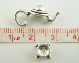 Detailed size measurement of antique silver teapot pendant components for DIY jewelry making