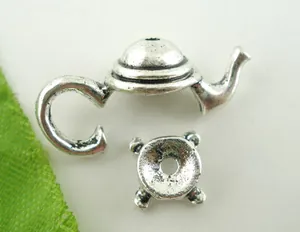 Detailed view of antique silver teapot shaped alloy DIY jewelry making pendants