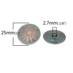 Detail view of 25mm vintage verdigris copper button with radial engraving and back shank