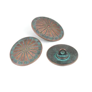 Vintage oval zinc alloy buttons with antique green patina finish and sunburst pattern