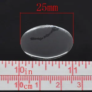 Adesivi ovali trasparenti in resina 25mm per gioielli fai-da-te mostrati con righello