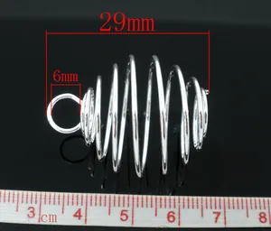 Macro detail of silver plated spiral cage bead pendant showing 29mm length dimensions