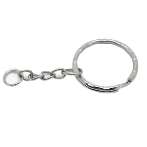 Minimalist silver metal keychain ring with chain extension on a clean white background
