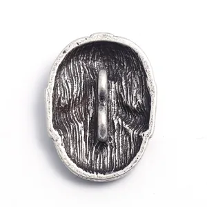 Antique silver metal skull button with vintage finish and thick shank for sewing