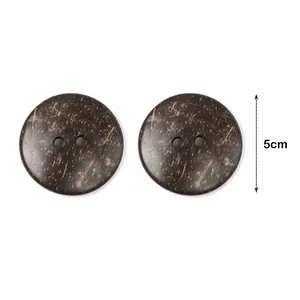 Macro shot of 50mm natural coconut husk wood buttons with two holes for coats