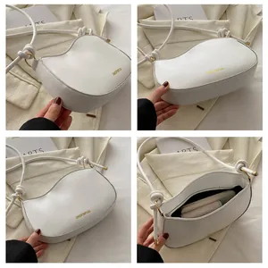 Detailed views of white crossbody bag with wave design and large inner capacity
