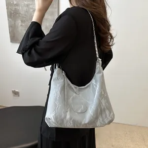 Silver pleated hobo bag with metal chain strap and long tassels for women 2024