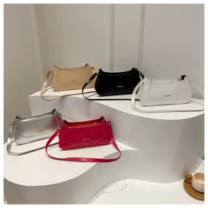 Selection of minimalist PU leather shoulder bags in black, white, beige, silver, and rose red