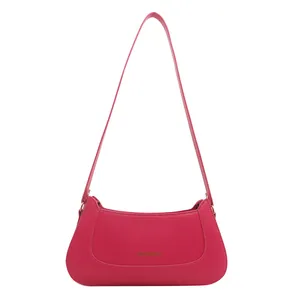 Minimalist fuchsia faux leather baguette shoulder bag with gold logo lettering