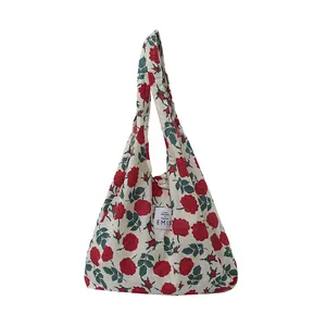 Sac fourre-tout en toile à fleurs avec imprimé roses et logo EMIS pour l'été et plage