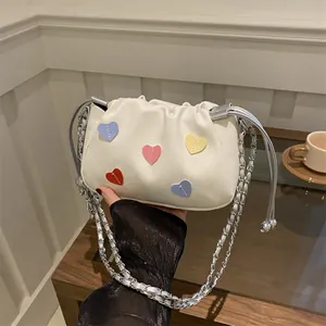 Fashionable bucket bag with colorful heart patches and chain strap for women