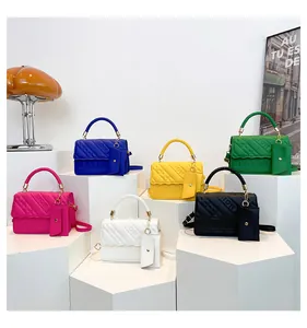 Detailed set of colorful leather crossbody bags with FASHION embossed texture and mini purses