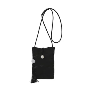 Mini sac bandoulière noir pour téléphone avec fermoir perle et longs glands noirs