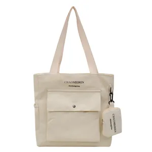 Große beige Canvas-Tragetasche mit Schultergurt und passendem Mini-Münzbeutel-Set