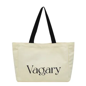 Sac cabas minimaliste en toile crème avec imprimé Vagary et anses contrastées