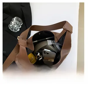 Top view showing large capacity of the brown leather tote bag for daily essentials