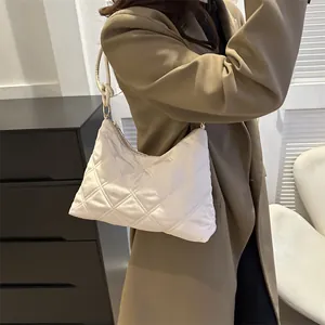 Minimalist beige quilted nylon underarm bag with large capacity for stylish women