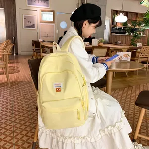 Zaino giallo stile giapponese per studenti ad alta capacità con tessuto in nylon impermeabile