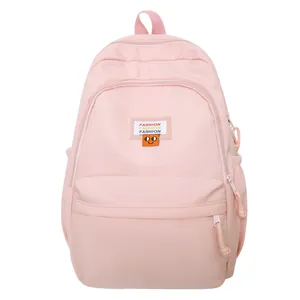 Zaino casual rosa chiaro per studenti con etichetta fashion e toppa cartoon, grande capacità