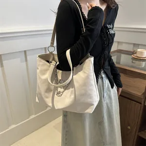 Urban large capacity white tote bag with stylish heart charm and silver chain strap