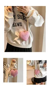 Détails du sac à main rose en forme de cœur avec strass brillants et chaîne dorée