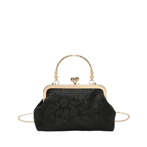 Elegant black jacquard evening clutch with gold metal handle and chain strap for women