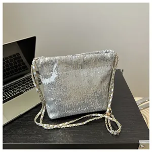 Sparkly silver sequin bucket bag for women with elegant metal chain shoulder strap
