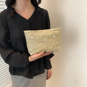 Handmade woven envelope clutch with floral embroidery for women stylish summer use