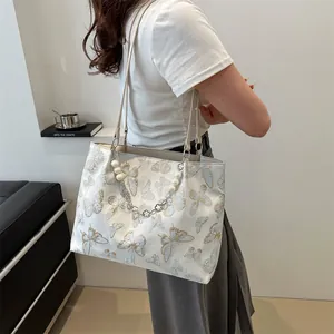 Women's jacquard tote bag with butterfly patterns and decorative pearl flower chain